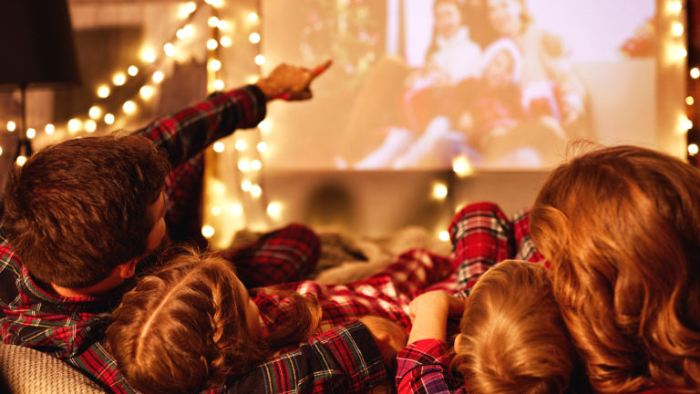 Snuggle up on the couch on Christmas Even and watch a christmas movie with the family.