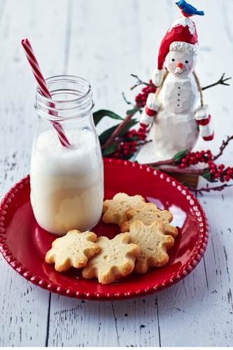 Bake santa cookies and leave out on christmas eve night with a glass of milk