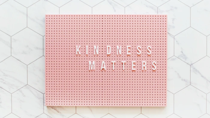 reminder sign to be kind to others
