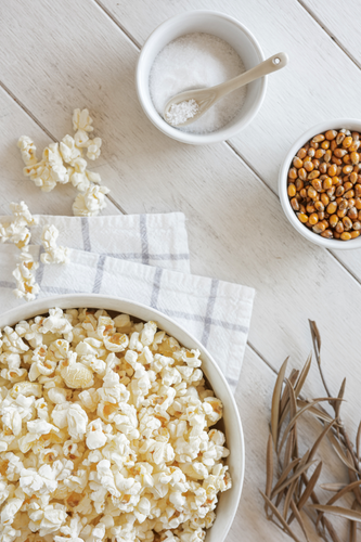 Pop festive popcorn for movie night on Christmas eve.