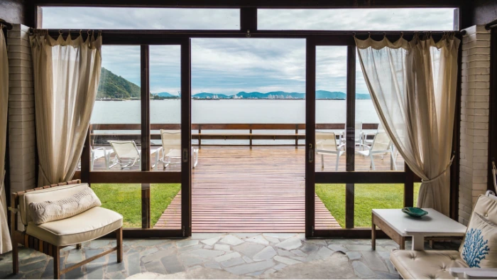Upgraded oceanfront room at beach resort.